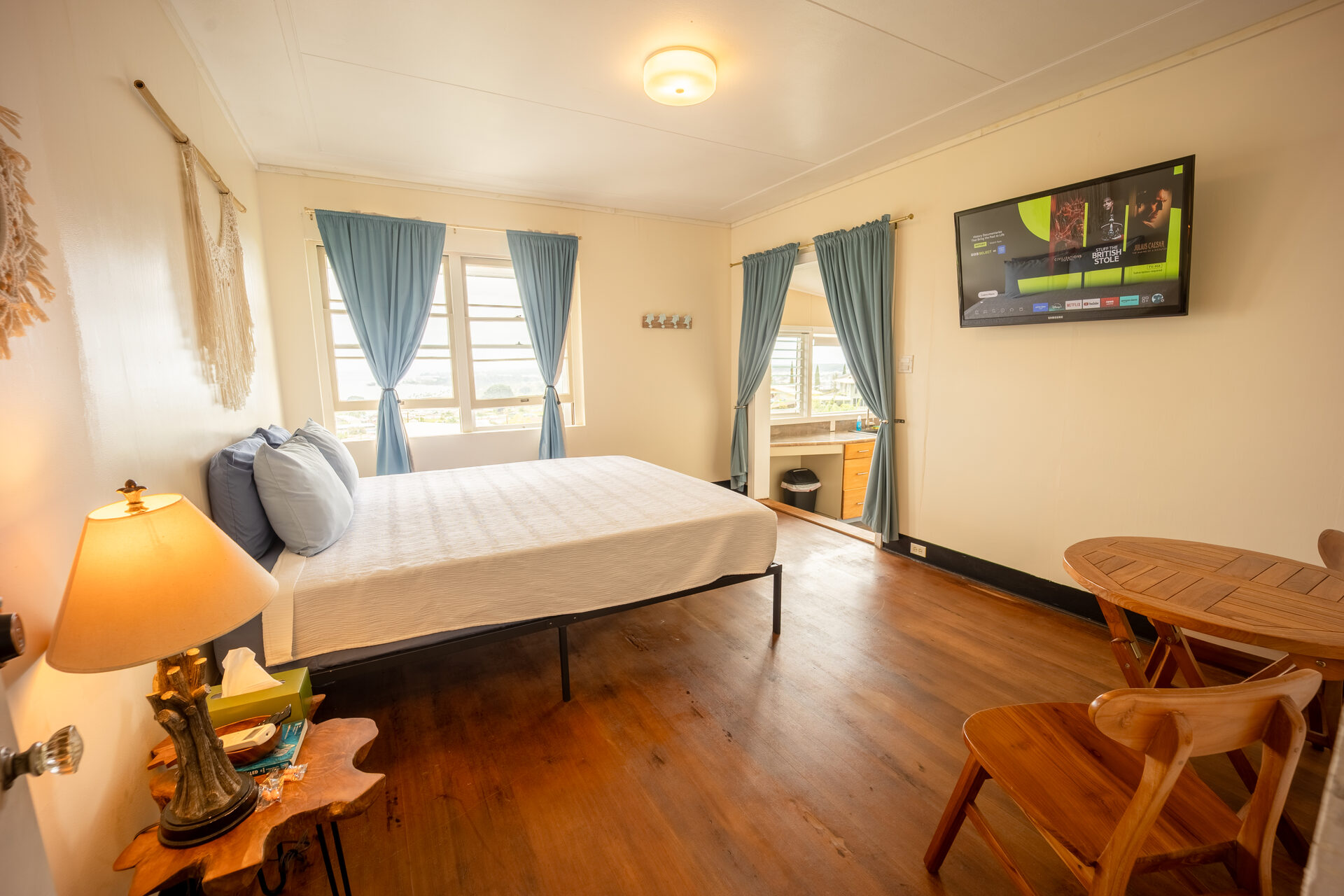 Sky Room with queen bed and blue coastal boho decor